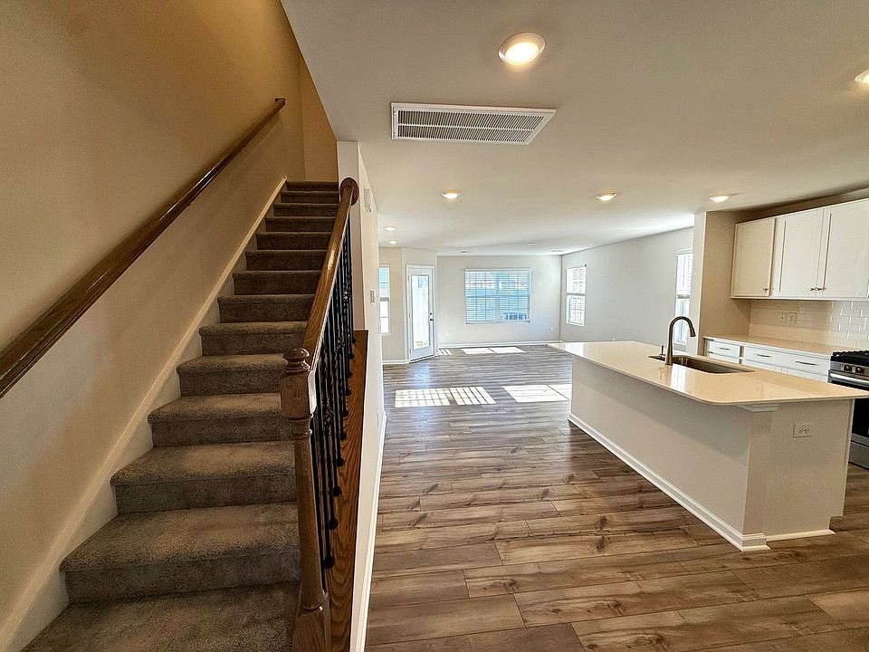 Main Entrance with Stairwell to 2nd story