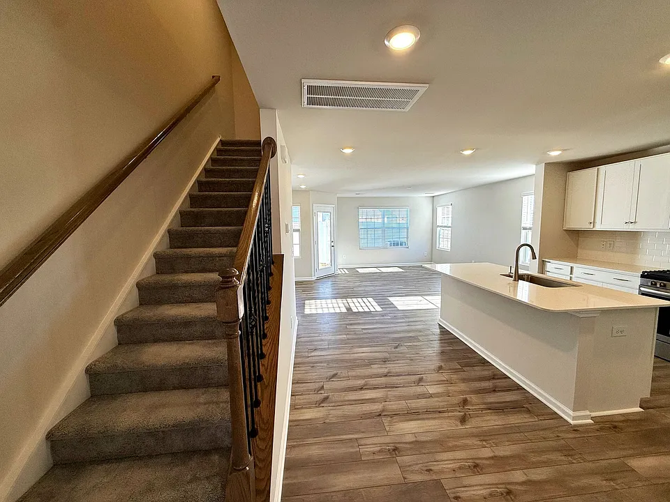 Main Entrance with Stairwell to 2nd story