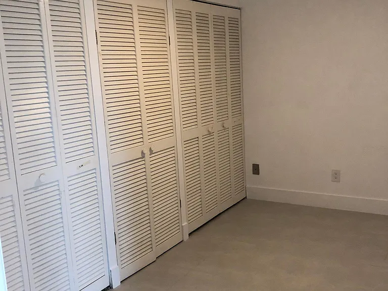 Guest Bedroom With lots of Closet space.