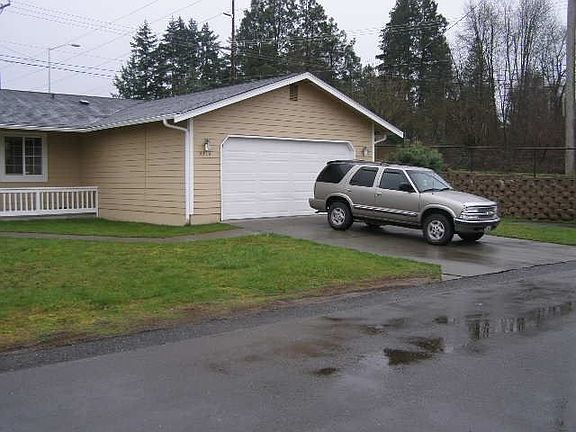Front showing two car attached garage.