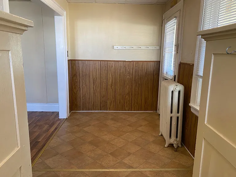 Entry door and eating area.