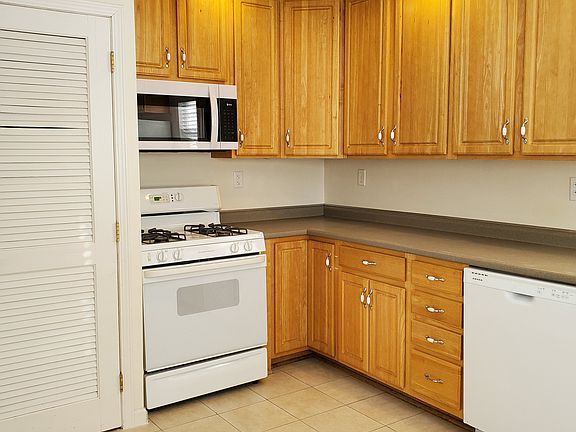 Gas stove, dishwasher, & new ceramic tile floor