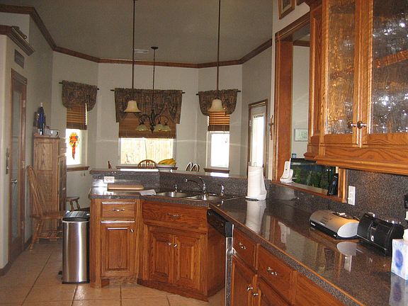 Spacious Kitchen with Red Oak Cabinets