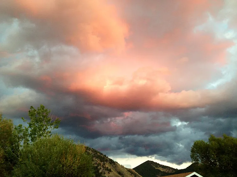 Back yard view sunset over the mountains.