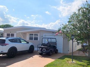 1003 Ginger Ln, Barefoot Bay, FL 32976