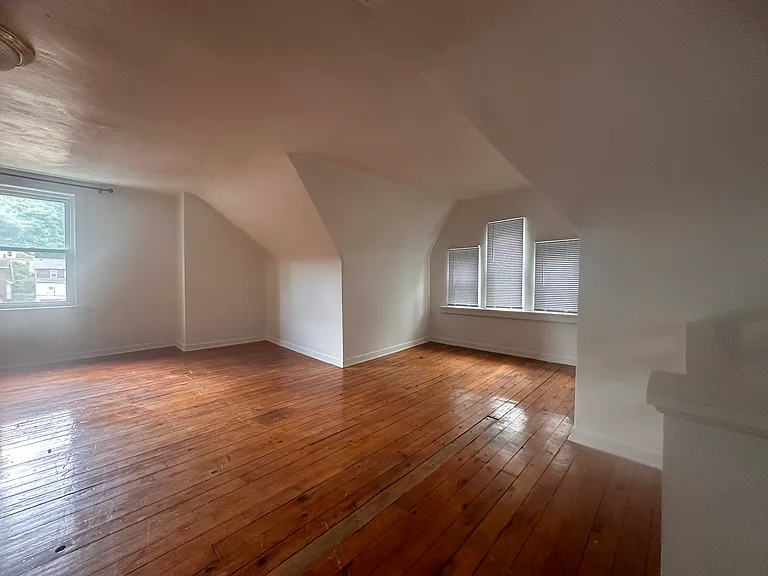Super Large attic space with separate air conditioning (in addition to central A/C in unit) and closet