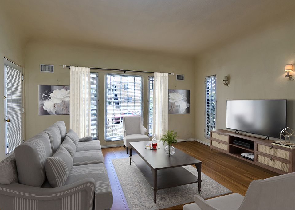 Spacious living room with huge windows with Huge Windows, or "combine" the living and dining rooms and use the hugs space as a Great Room