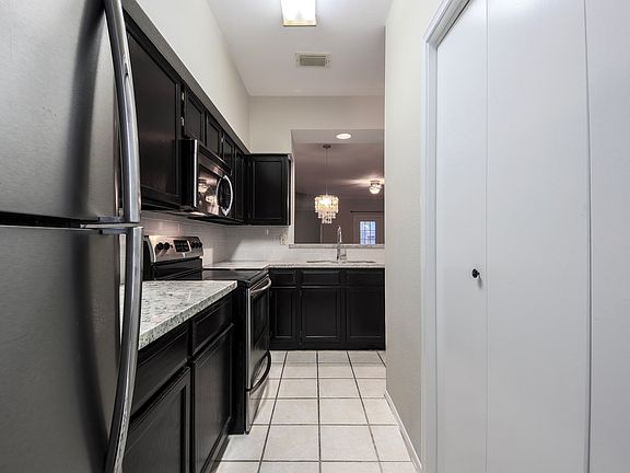 Washer and dryer in unit, to the right