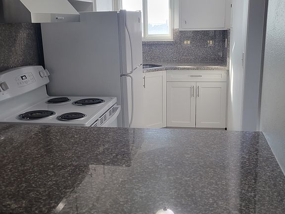 Another perspective of the kitchen from the living room