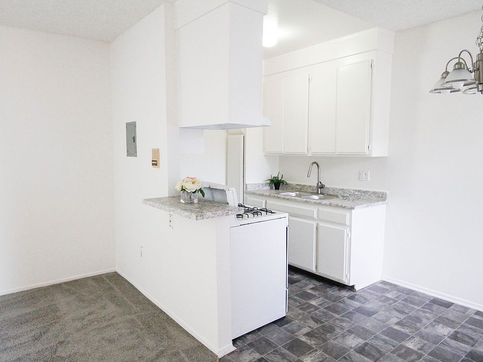 1st image of 7457 Woodman Ave #16