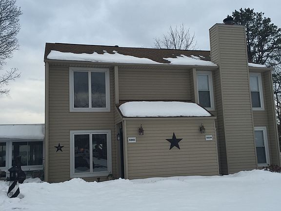 Snow view of townhome