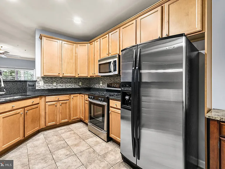 9720 Holmes Pl #103 — Photo 7