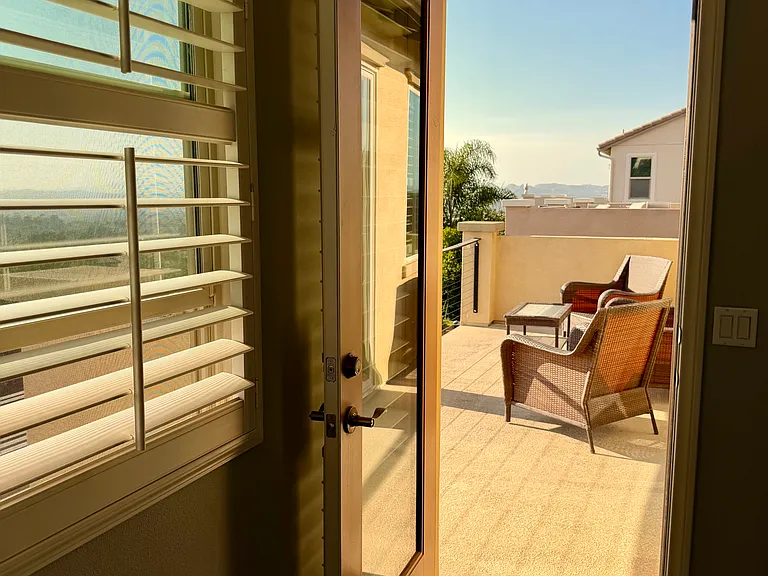 Door from Primary Suite to Upstairs Deck