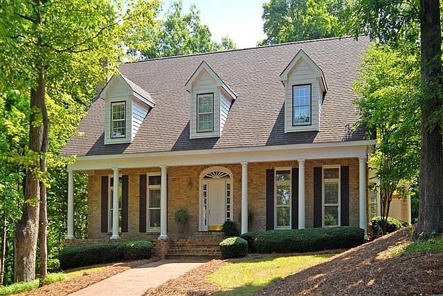 Drive up to a circular driveway to the front of the house