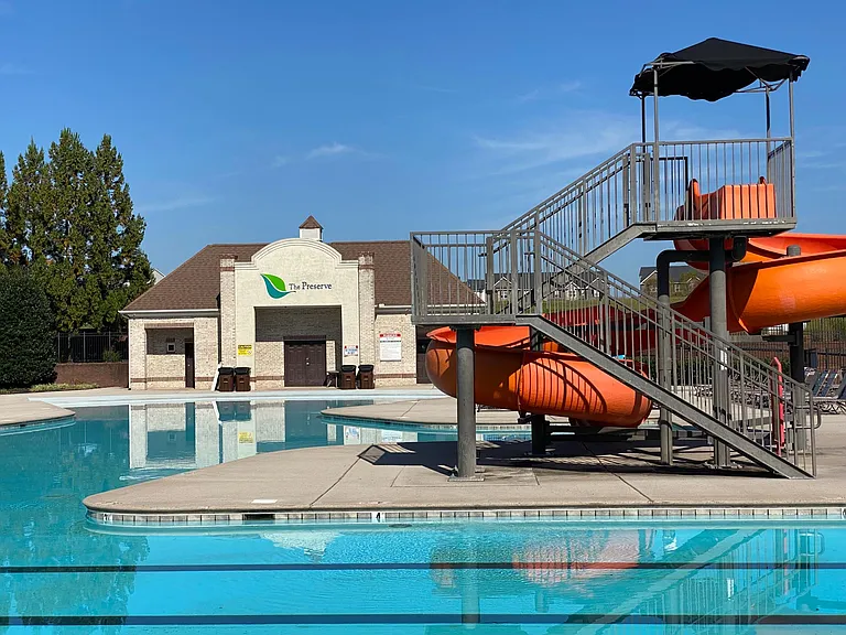 Outdoor pool and circular slide