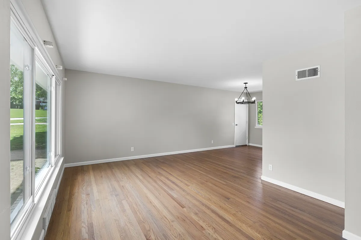 Open Living Area and Dining Area - 1209 Foxview Ter