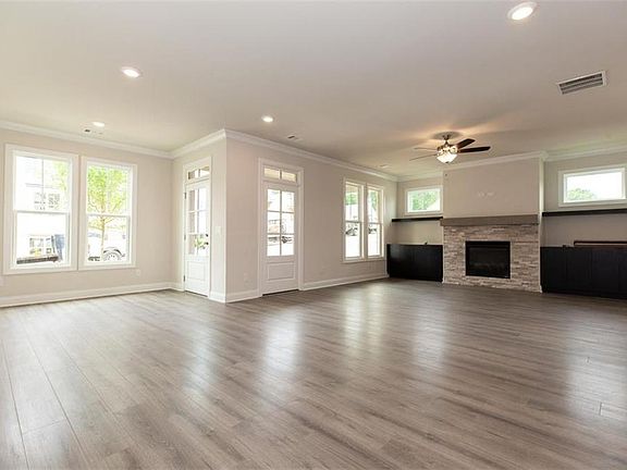 Beautiful room family room. Lots of cozy areas in front of the fireplace. Photos not of actual hom