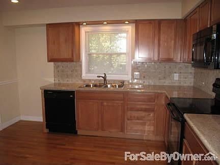 Kitchen
						:
						Remodeled kitchen. New cabinets, granite countertops, travertine tile. (11x11)