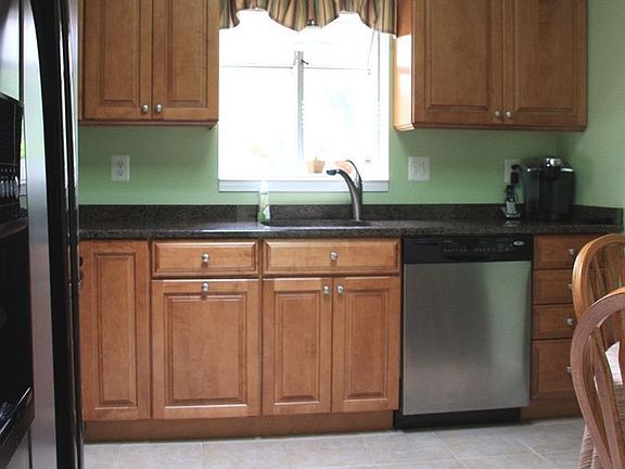 Solid Maple Cabinets - Granite Countertop - Under-mount sink