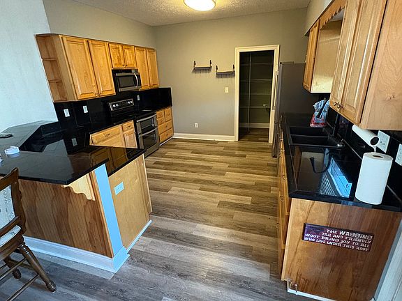 Kitchen and walk in pantry. 
Double oven. 
Brand new fridge with craft ice maker.