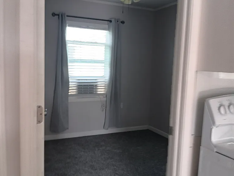 New carpet and AC in bedroom