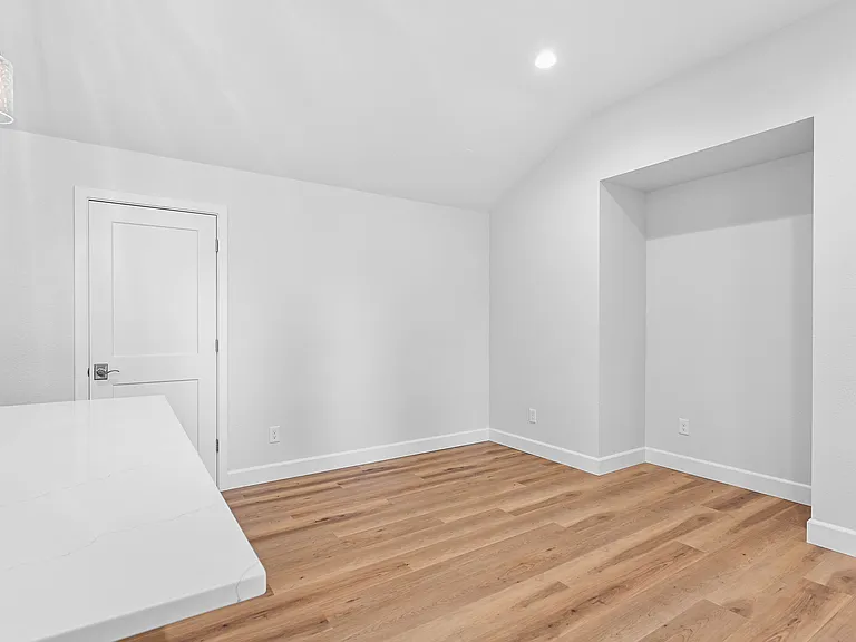 Dining room. Closed door is pantry.