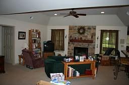 Living Room With Fireplace and Open Floor Plan 