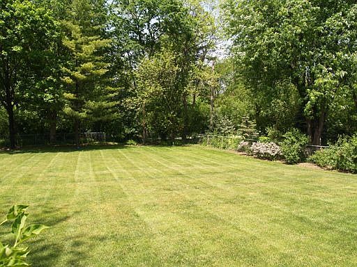 1/2 acre backing to Prairie Path