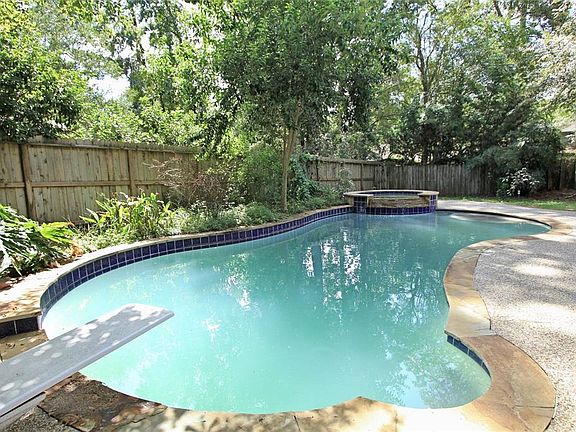 The Back Yard is quite private with a canopy of trees.