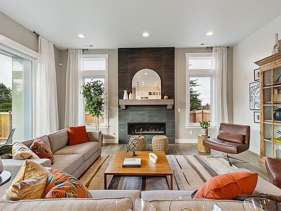 Spacious great room centered on gas fireplace