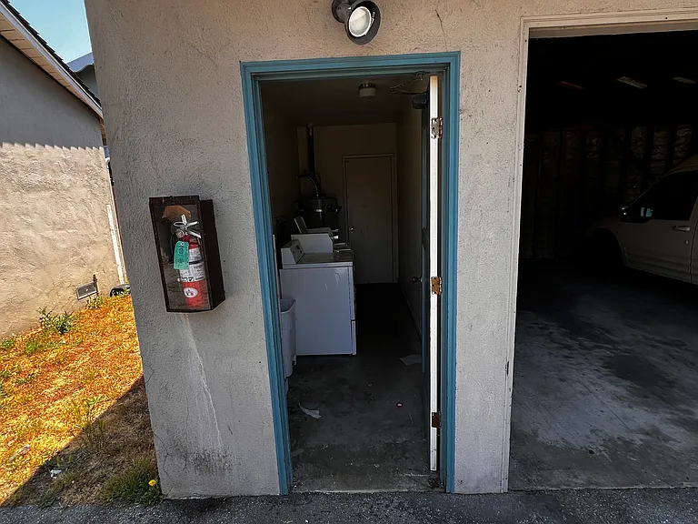 laundry room next to carport