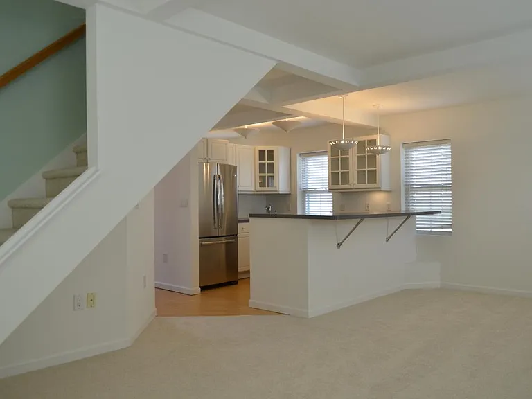 Living room with a view of the 4 place counter