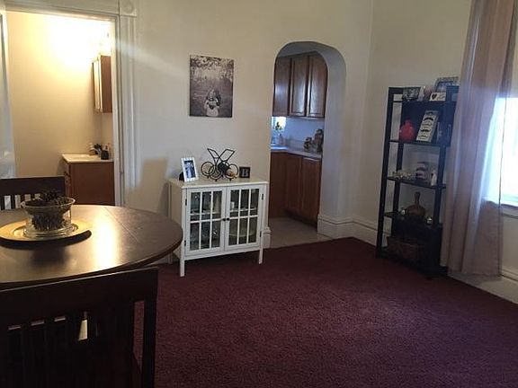 Dining room, with entrance to bathroom and kitchen.