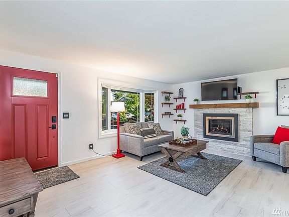 New bay window adds light and architectural interest to this cozy space.