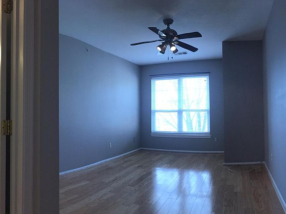 panoramic view of master bedroom with partial view of bathroom