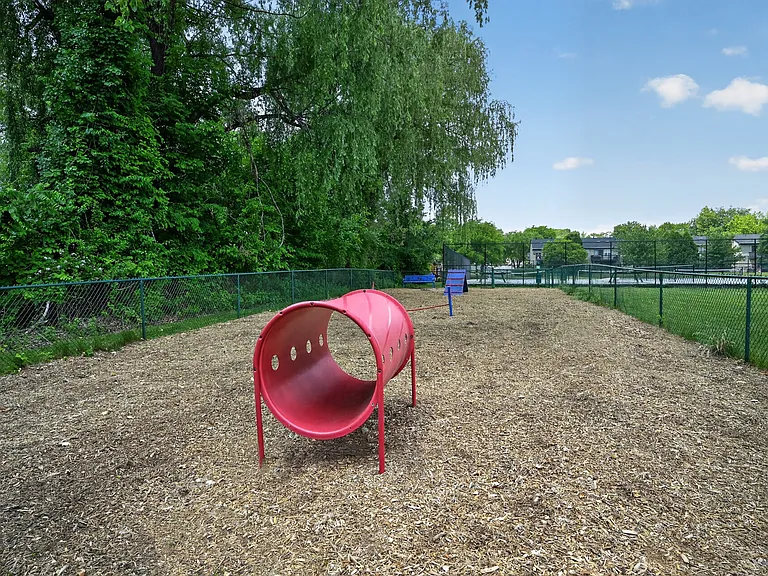 At Eagle Rock Apartments at Mohegan Lake, delight in our spacious outdoor play area designed for fun and relaxation. Perfect for pets and families alike, this vibrant space invites joyful moments in the sun. Explore our community today!