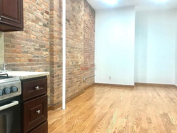 3rd image of 261 E 10th St APT C