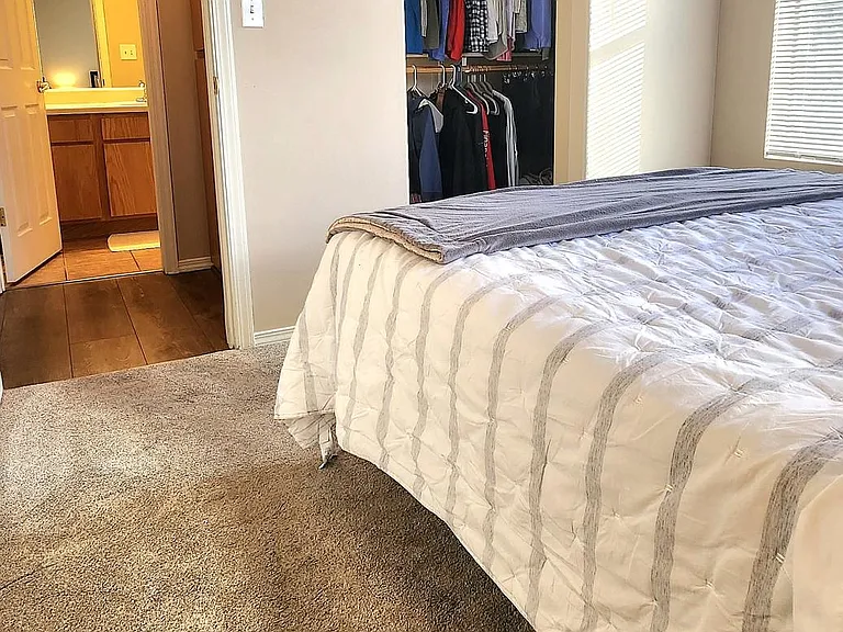 Downstairs primary bedroom and closet
