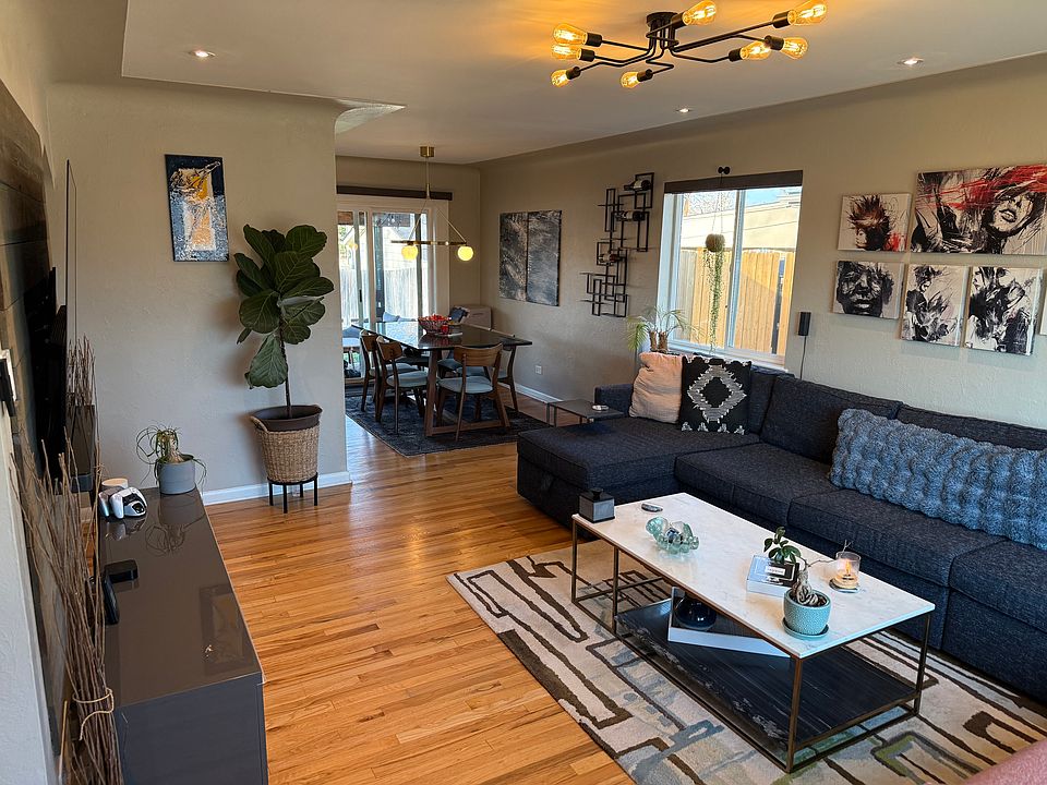 Living Room to Dining Room (*Current tenants furnishing)