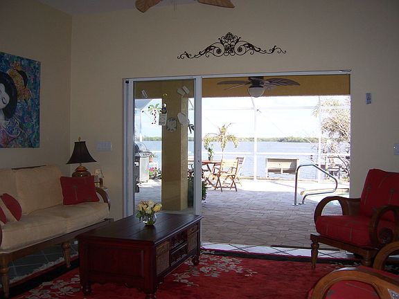 Living room overlooking pool & river
