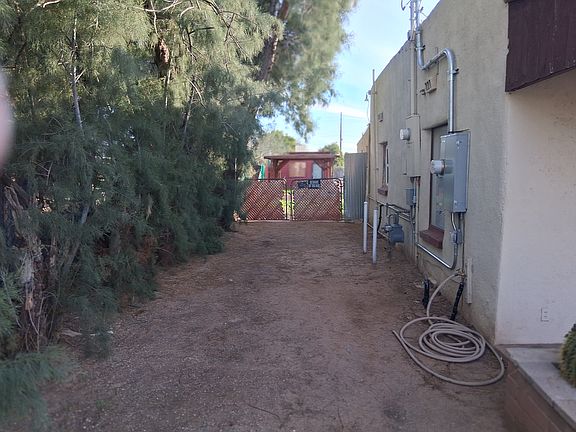 East side area for parking. Off-street parking is also available in front of the home.