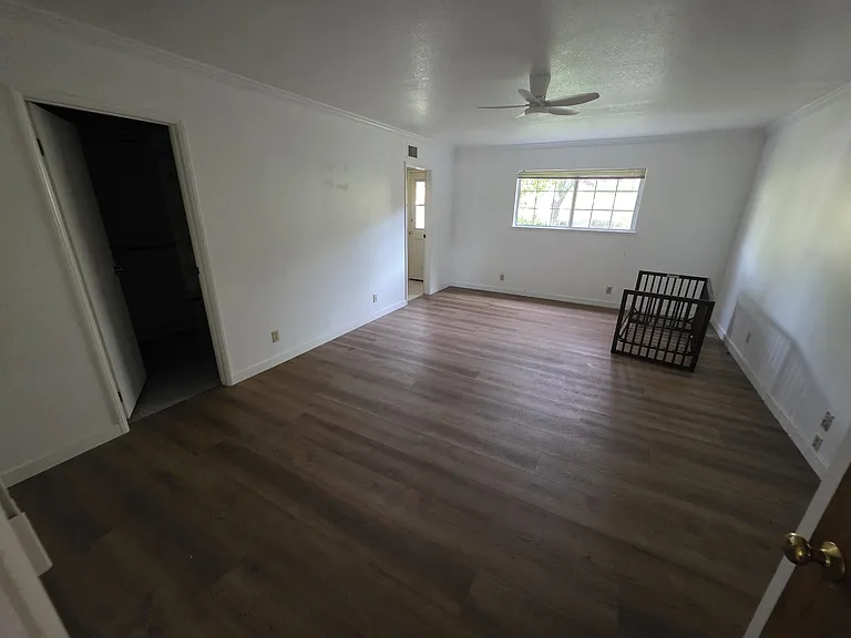 Master bedroom with walk-in closet and master bathroom