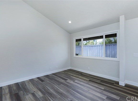 Vaulted Ceilings in Living Room plus All-New Wood-Vinyl Flooring