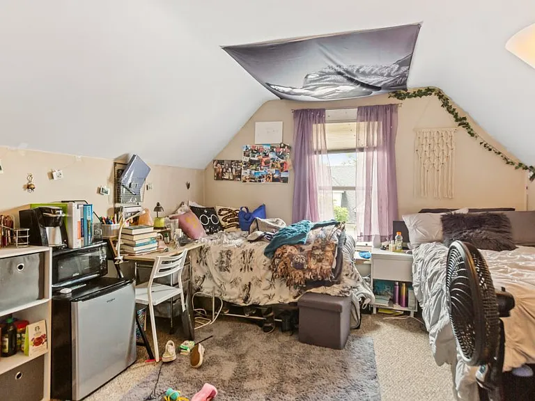 3rd floor spacious bedroom with in room HVAC unit and closet. You can share this room or have it for yourself.