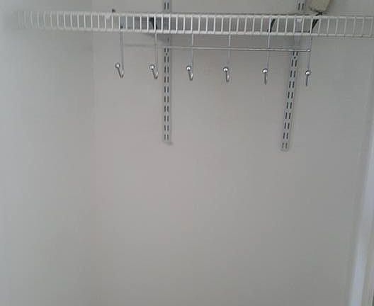 coat closet by the front of the door