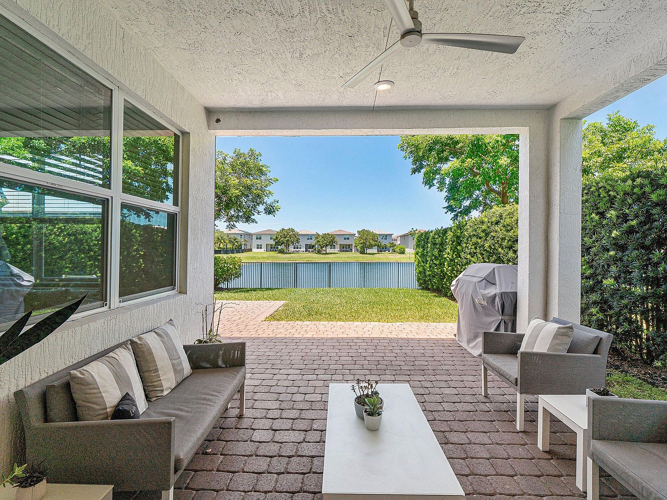 Covered patio overlooking the lake at 1091 Verde Court