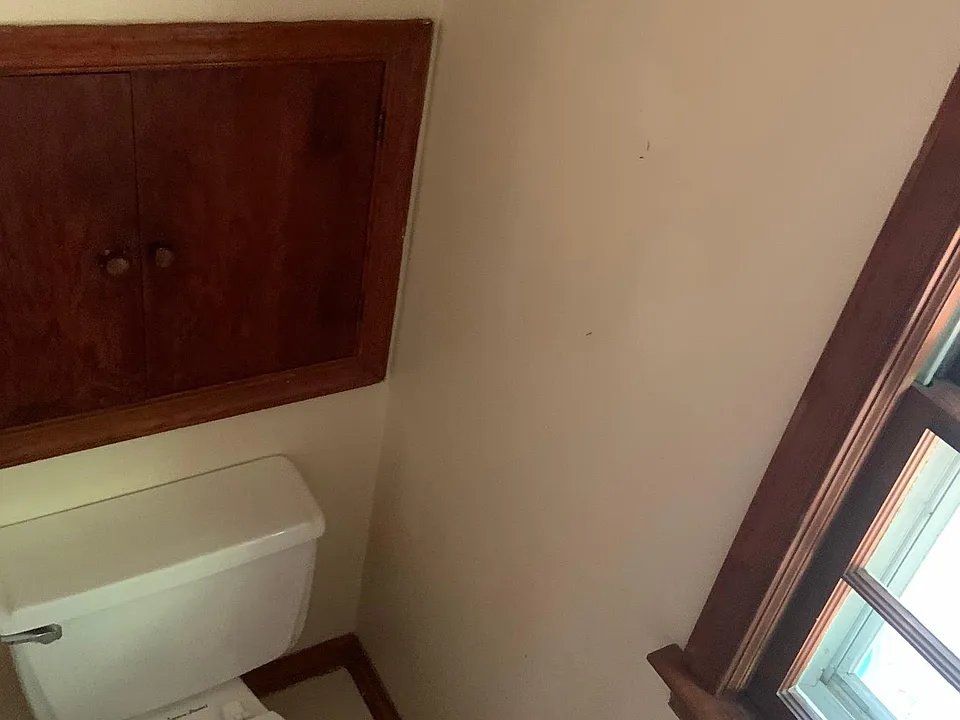 This is the half bath on the main level. This bathroom has just the toilet and sink. The shower stall is on the upper level.