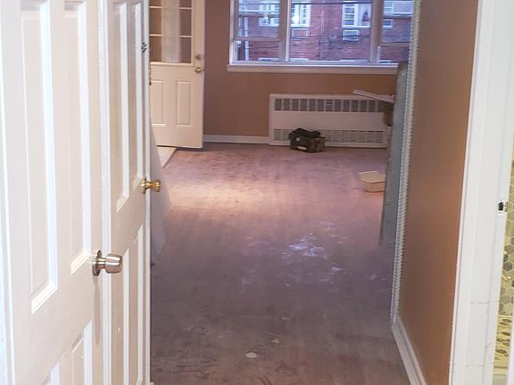 Hall way from bedroom facing living room.