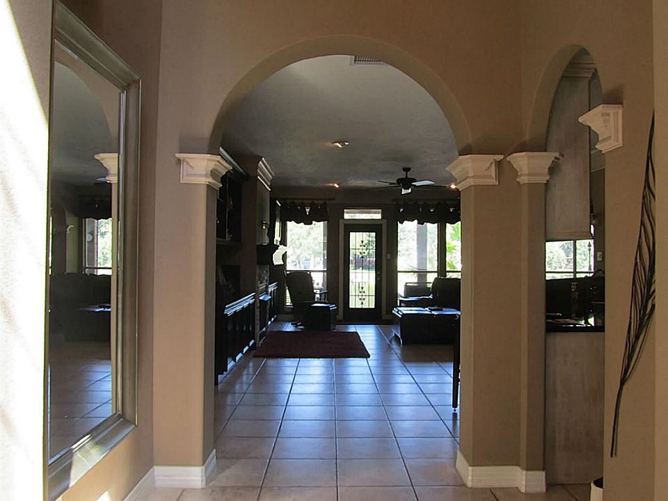 Archways invite you into your warm contemporary styled home
