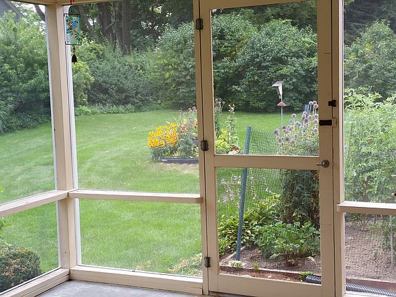 Porch door leading to backyard